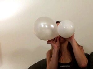 Beautiful Lady In Glasses Blowing Balloons In A Reality Shoot Porn
